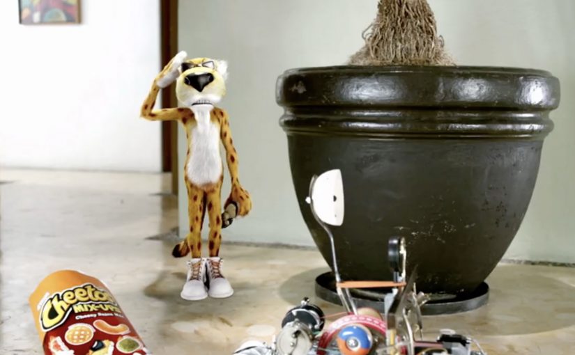 Cheetos Mix-Ups Cheetahpult dual-screen game campaign visual with snack pieces launching across the screen.