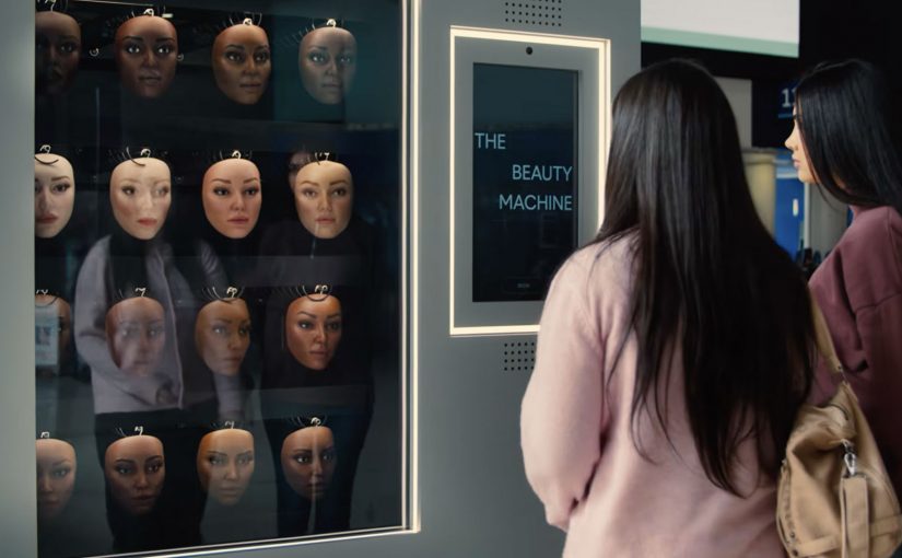Two women view Dove’s Beauty Machine at Waterloo Station, where rows of apparently different face masks represent one repeated beauty ideal.
