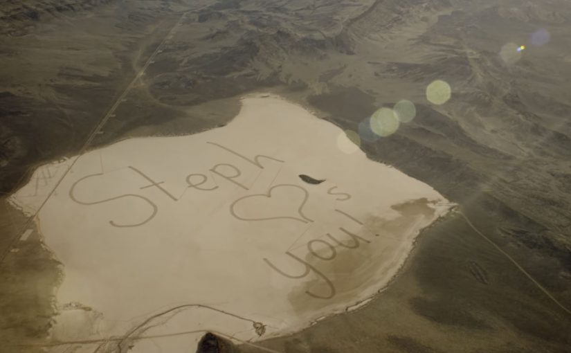Eleven Hyundai Genesis sedans carve “Steph loves U” into Nevada’s Delamar Dry Lake.