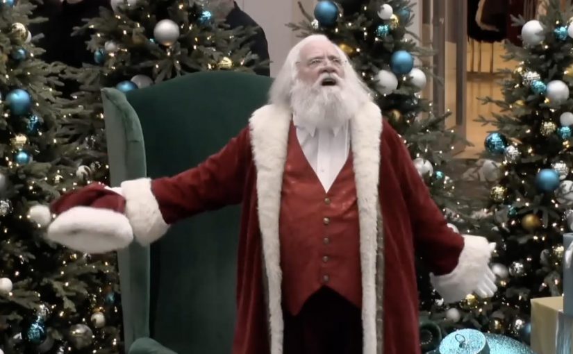 Adults line up to sit on a mall Santa during Improv Everywhere’s “Too Old to Sit on Santa” stunt.