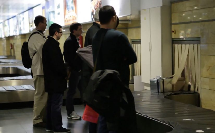 Wrapped gifts arrive on a Spanair baggage carousel as a Christmas Eve surprise for passengers.